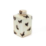 A Chinese crackle glaze tea canister and cover, painted with flowers, butterflies and moths, 16cm