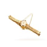 A 9 carat gold lady's wrist watch, by Girard Perregaux