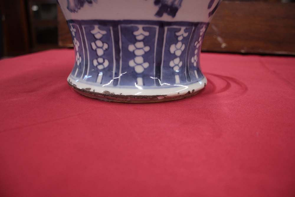 A 19th Century Chinese blue and white baluster vase and cover, decorated with figures and prunus, - Image 13 of 17