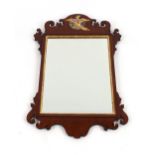 A mahogany Chippendale style fret carved wall mirror, having gilt Ho Ho bird motif, 75cm x 52cm in