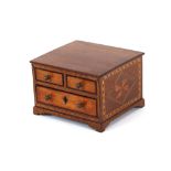 A 19th Century mahogany and parquetry decorated apprentice piece chest, of two short and one long