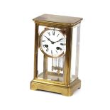 A 19th Century French brass cased four glass mantel clock, with 8 day movement striking on a bell,