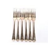 A set of six George III Old English pattern silver three pronged forks, with entwined monogram and