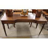 A 19th Century mahogany serving table, concave front, raised on ring turned tapering supports, 165cm