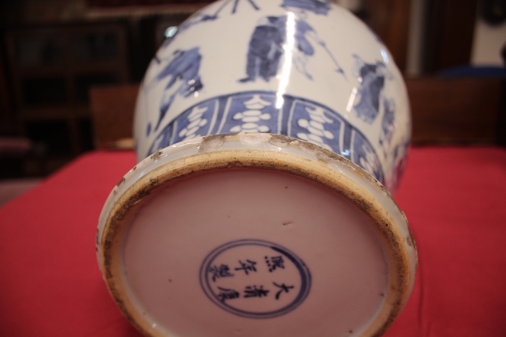 A 19th Century Chinese blue and white baluster vase and cover, decorated with figures and prunus, - Image 16 of 17