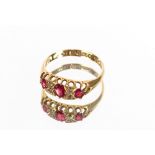 An 18 carat gold three stone ruby and diamond ring