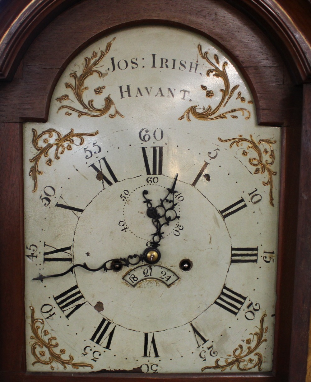 A mahogany and satinwood cross-banded long case clock, the painted dial inscribed "Jos.Irish