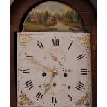 An oak long case clock, the arched hood enclosing a painted dial, inscribed "Carley, Thetford", 8