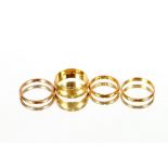 Two 22ct gold wedding bands, 4.5gms; an 18ct gold wedding band 6gms; and a 9ct gold wedding band 1.