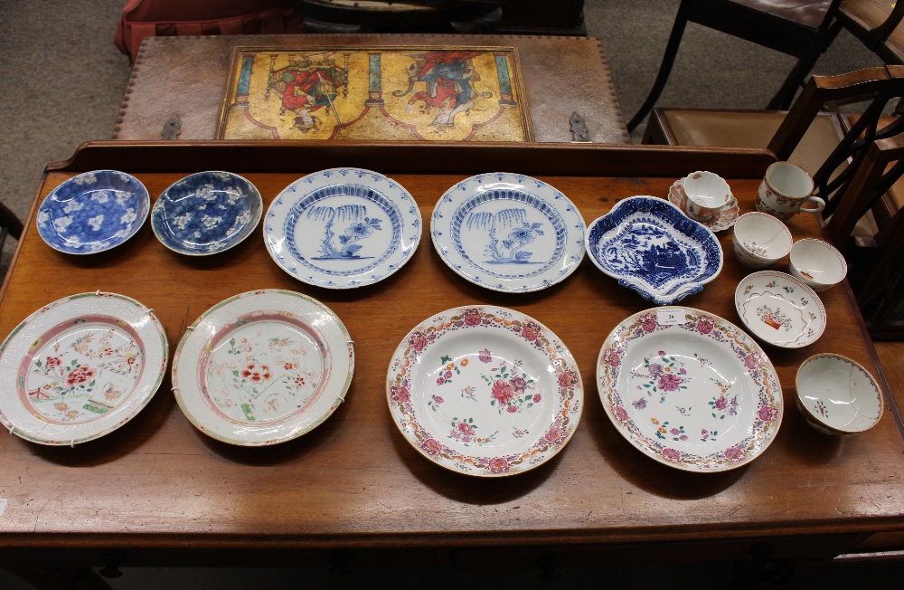 A pair of 18th Century Delft plates, having foliate decoration, 22.5cm dia.; a pair of 19th