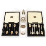 A cased set of six silver tea spoons; a cased set of six silver bean end coffee spoons; a silver