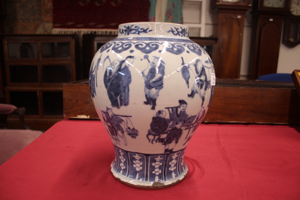 A 19th Century Chinese blue and white baluster vase and cover, decorated with figures and prunus, - Image 11 of 17