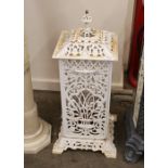 A Victorian cast iron heater, having pierced decoration between carrying handles, 79cm high