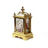 A 19th Century French brass and porcelain cased mantel clock, surmounted by floral and fruit finials