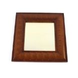 An 18th Century style oyster veneered cushion framed wall mirror, 58cm x 53cm