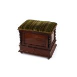 A Victorian rosewood music seat/Canterbury, the upholstered lifting top opening to reveal a fitted