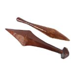 Two 19th Century South Pacific Island hand clubs, one of sword shape, the other of torpedo shape