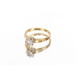 A gold solitaire diamond ring