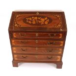 A 19th Century mahogany cross-banded and marquetry inlaid bureau, the fall front opening to reveal