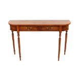 A walnut and cross banded demi-lune shaped hall table, fitted two short drawers and raised on turned