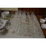 A quantity of various drinking glasses