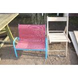 A children's metal bench together with a folding c