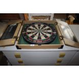 A unicorn dartboard in fitted case