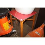 A Formica topped kitchen table