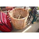 A wicker log basket and contents