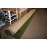 An approx. 12' x 8'10" green carpet