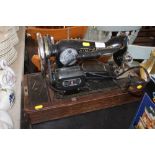 A Singer sewing machine - sold as collector's item