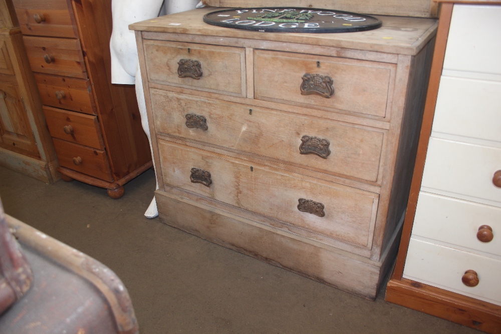 A satinwood Edwardian chest fitted two short over