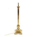 A large brass corinthian column lamp standard, raised on square foliate decorated base, 125cm high