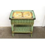 A green loom type two tier work table; and three wooden and chrome mounted cocktail trays