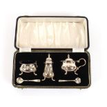 A cased silver three piece cruet set, Birmingham 1