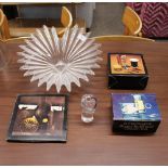 A Dartington glass fruit bowl; a Dartington glass sugar bowl and cream jug, boxed; Irish coffee