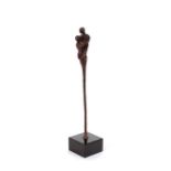 A bronze modernist study of an embracing couple, on black onyx base, 44cm high