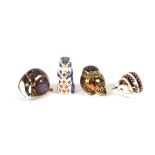 Four Royal Crown Derby animal paperweights, badger