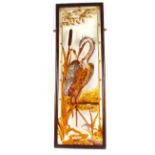 An Art Nouveau painted glass panel depicting stork