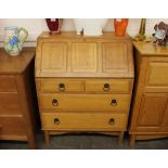 A good quality golden oak bureau, the fall front i