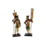 A pair of cold painted spelter figures, depicting