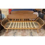 A light Ercol day bed