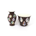 A West German pottery coloured enamel decorated jardiniére and matching vase
