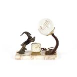 A French Art Deco table lamp clock, with antelope decoration, 27cm long