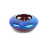 A blue iridescent Art Glass bowl, of squat form wi