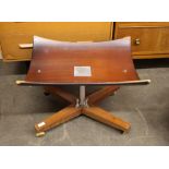 An Eames style upholstered footstool