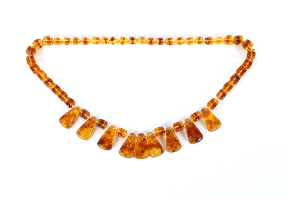 A string of vintage amber coloured beads