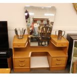 An Art Deco design light oak dressing table, with