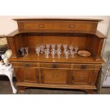 An Arts & Crafts oak sideboard by Wylie & Lochhead