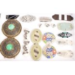 A collection of various vintage buckles, dress cli